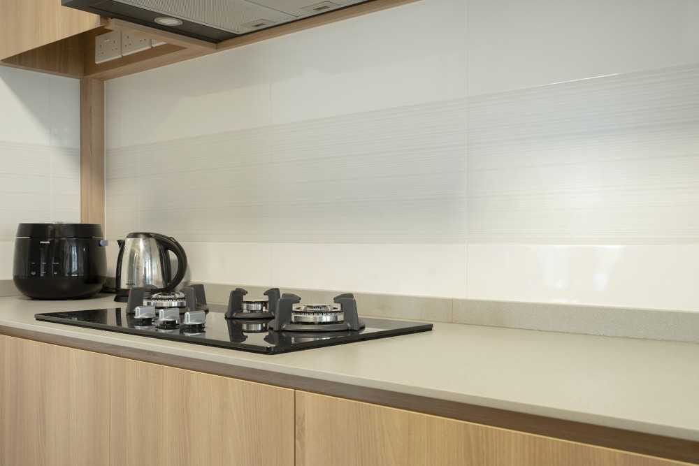 Scandinavian Kitchen with Countertop and Homogeneous Tiles