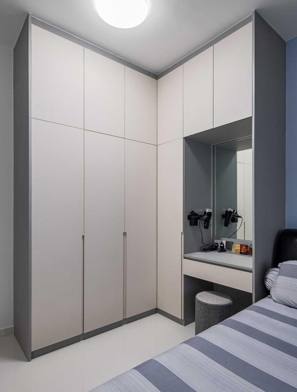 Scandinavian Bedroom with Homogeneous Tiles and Wardrobe