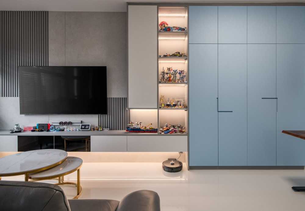 Scandinavian Living Room with Bookshelf and Homogeneous Tiles