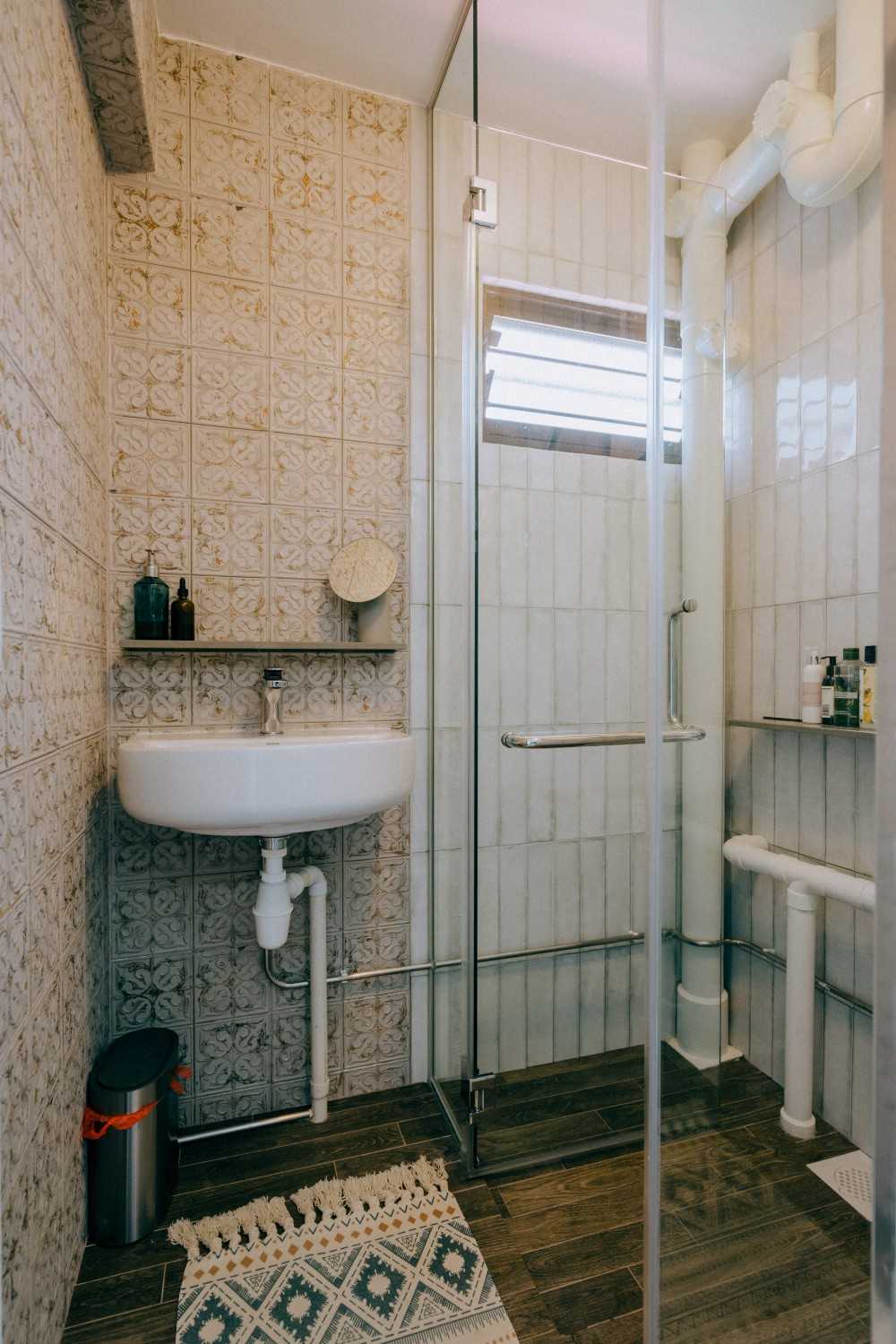 Vintage Bathroom with Shower Screen and Porcelain Tiles