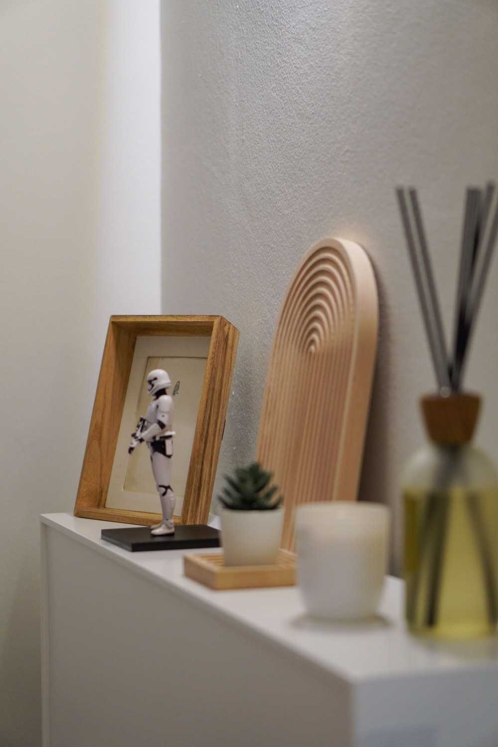 Scandinavian Entryway with Small Storage and Display Cabinets