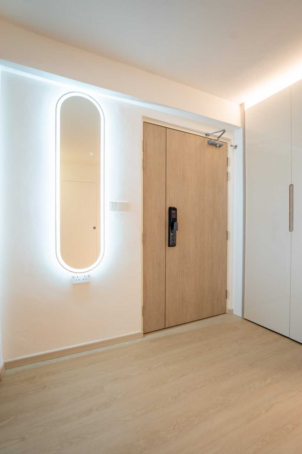 Scandinavian Foyer with Mirror and Storage Cabinets