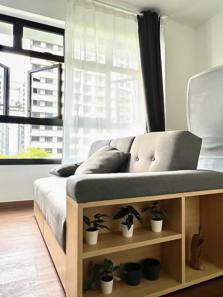 Scandinavian Living Room with Window Grille and Sofa