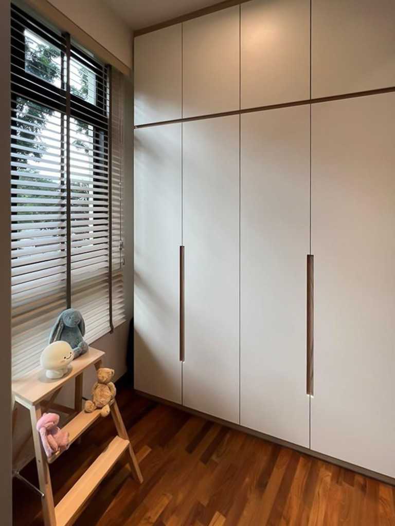 Scandinavian Bedroom with Wardrobe and Paintings