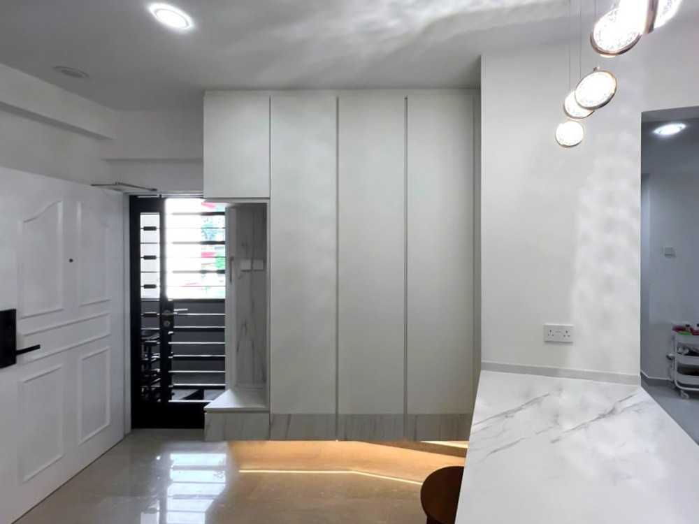 Scandinavian Foyer with Storage Cabinets and Small Storage
