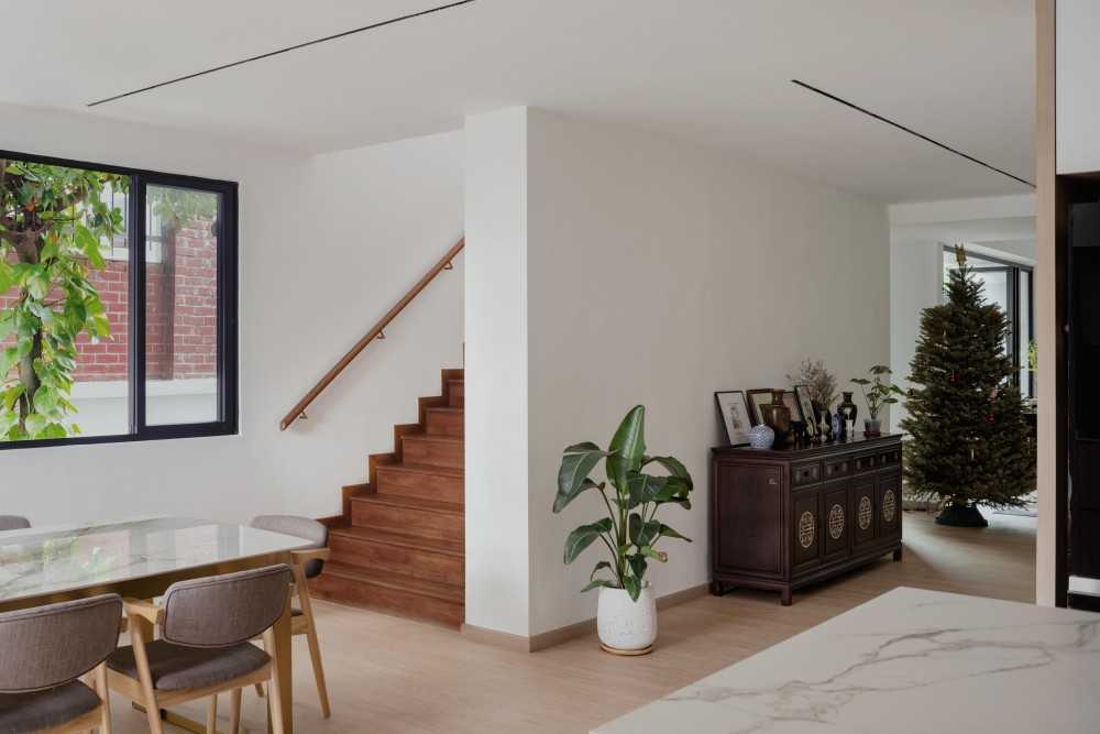 Scandinavian Foyer with Kitchen Island and Staircase