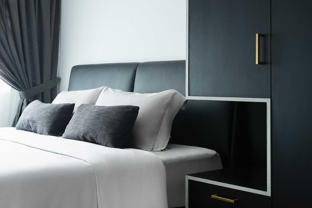 Contemporary Bedroom with Homogeneous Tiles and Wardrobe