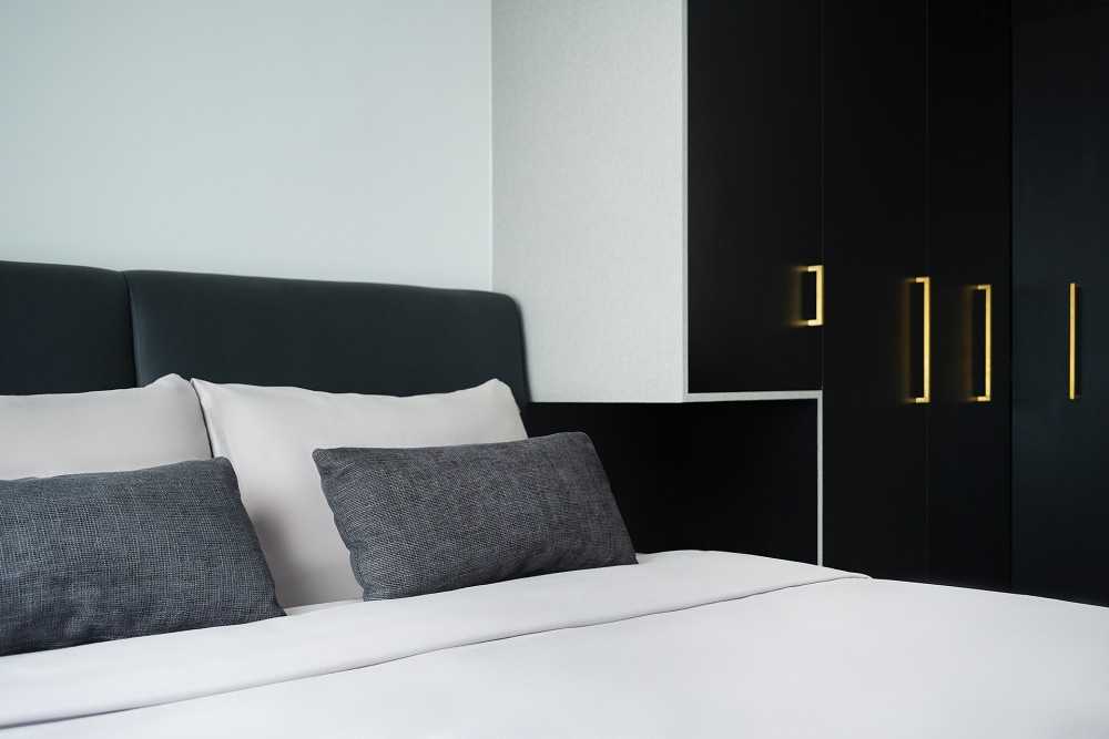 Contemporary Bedroom with Homogeneous Tiles and Wardrobe