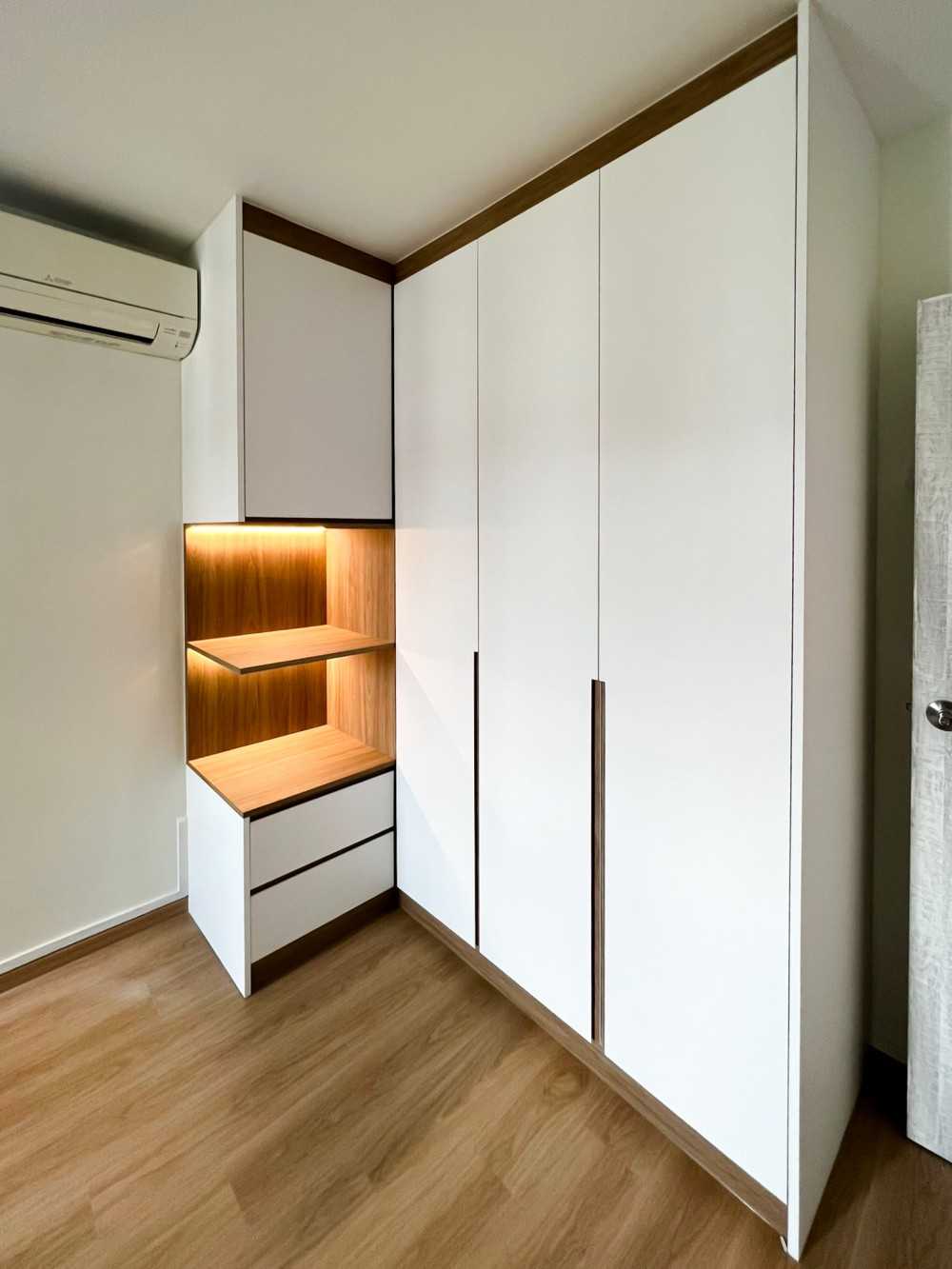 Scandinavian Bedroom with Wardrobe and Paintings