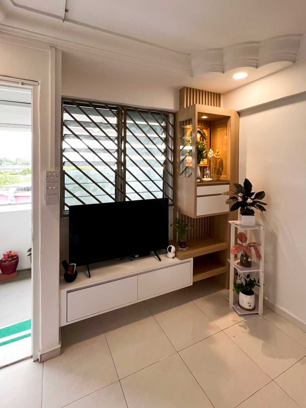 Scandinavian Living Room with TV Console and Paintings