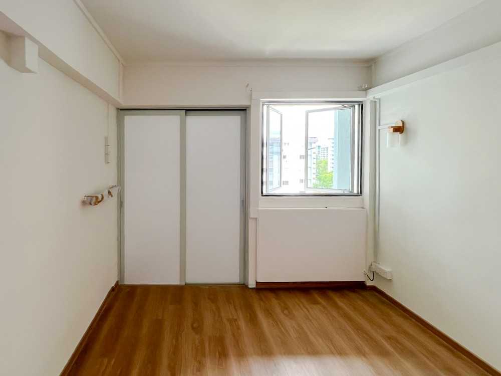 Scandinavian Bedroom with Window Grille and Paintings