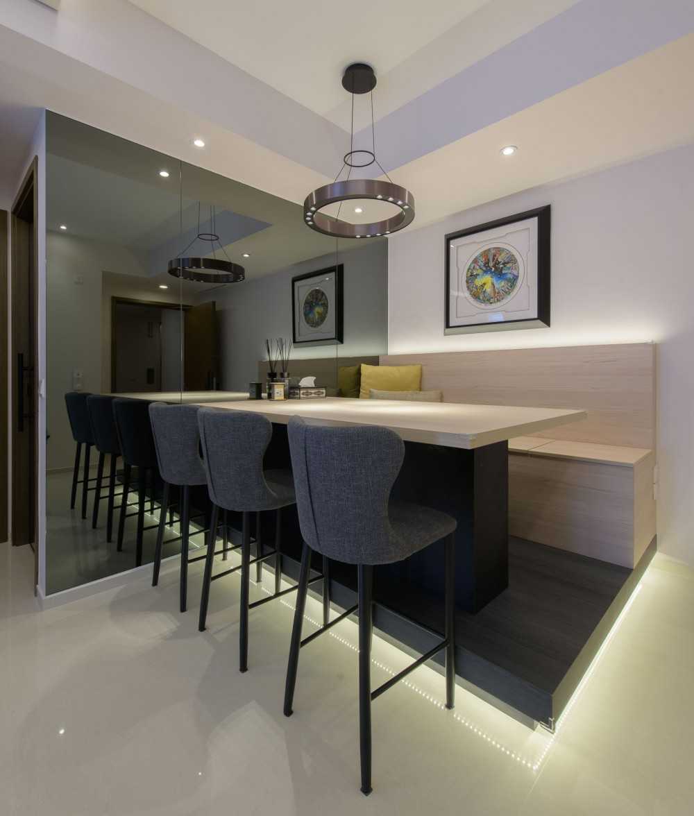 Modern Dining Room with Cove Lighting and Downlights