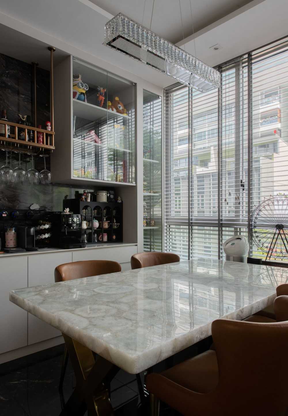 Modern Dining Room with Chandelier and Bar Counter