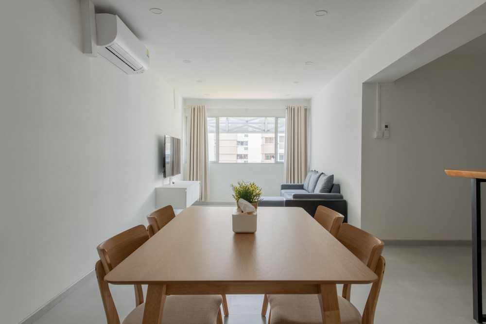 Scandinavian Living Room with TV Console and Curtain