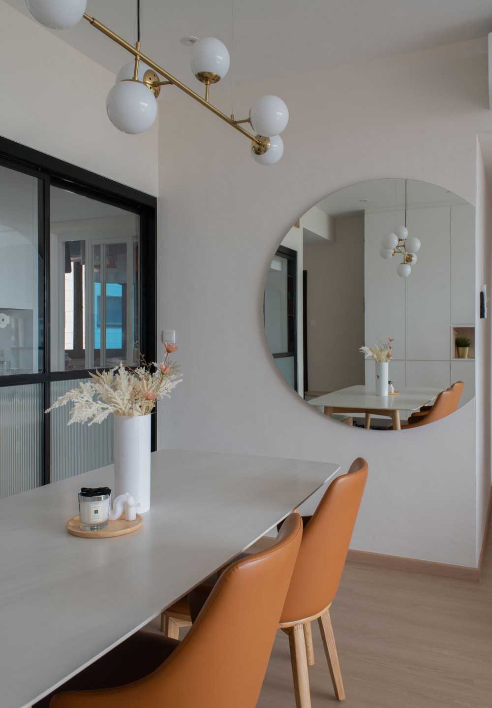 Scandinavian Dining Room with Mirror and Dining Table
