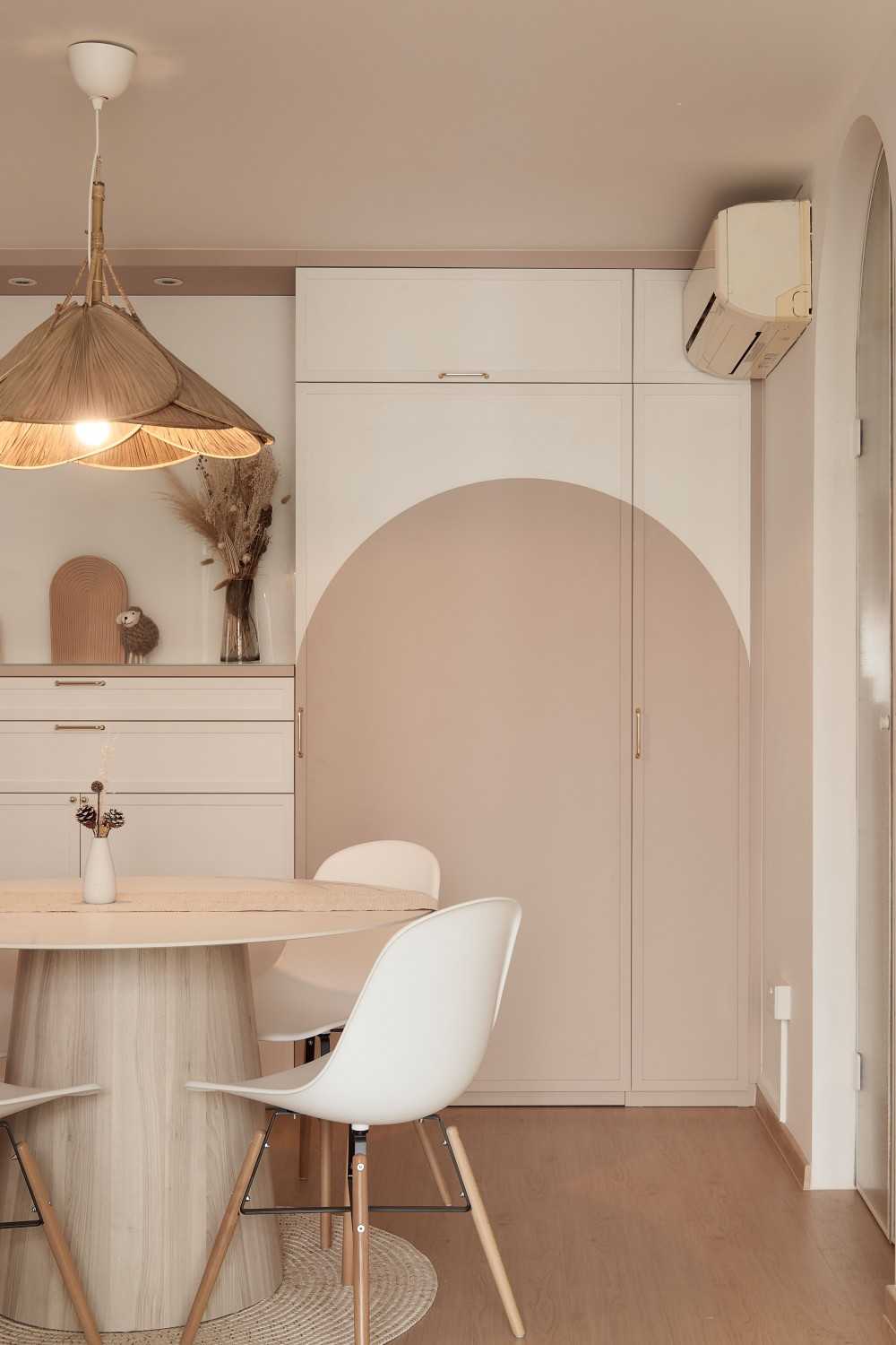 Scandinavian Dining Room with Ceiling Light and Storage Cabinets