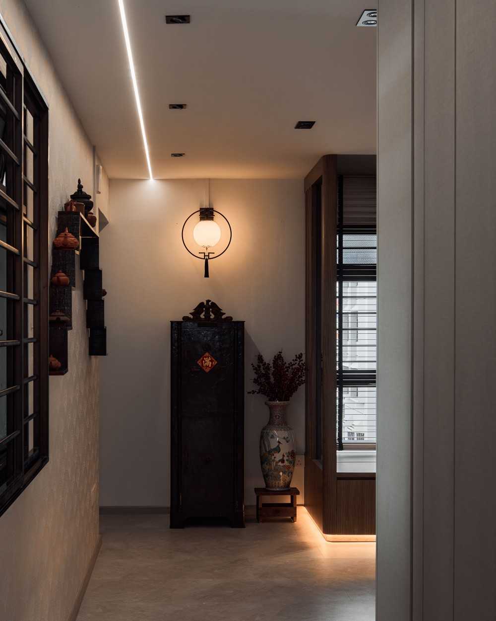 Transitional Foyer with Artwork and Wallpaper