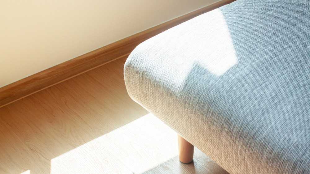 Scandinavian Living Room with Vinyl Flooring and Sofa