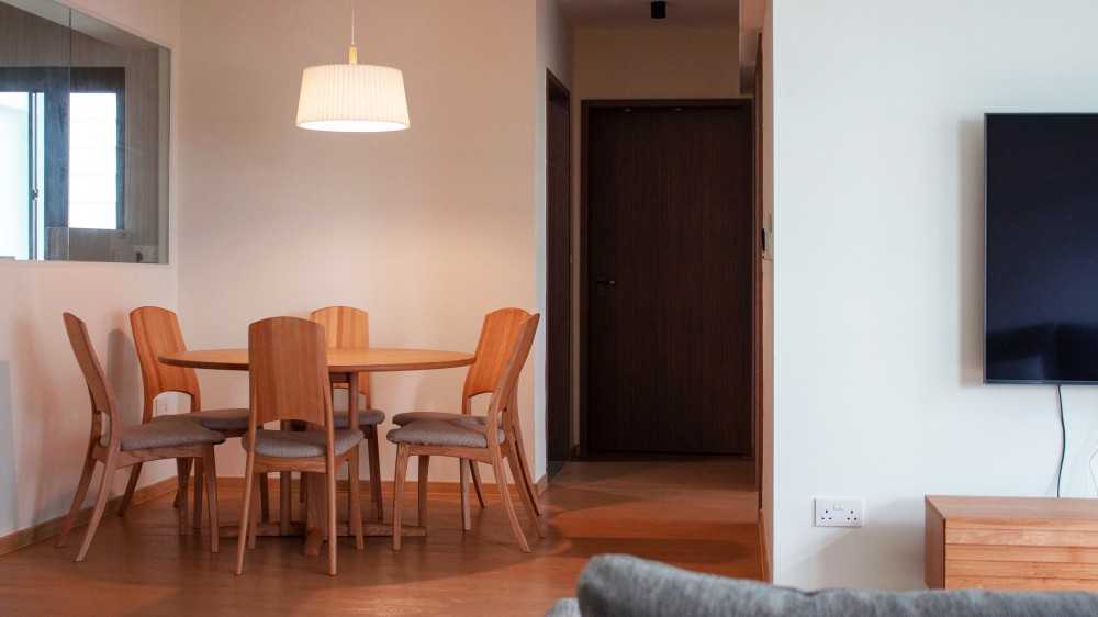 Scandinavian Dining Room with Open Kitchen and Dining Table
