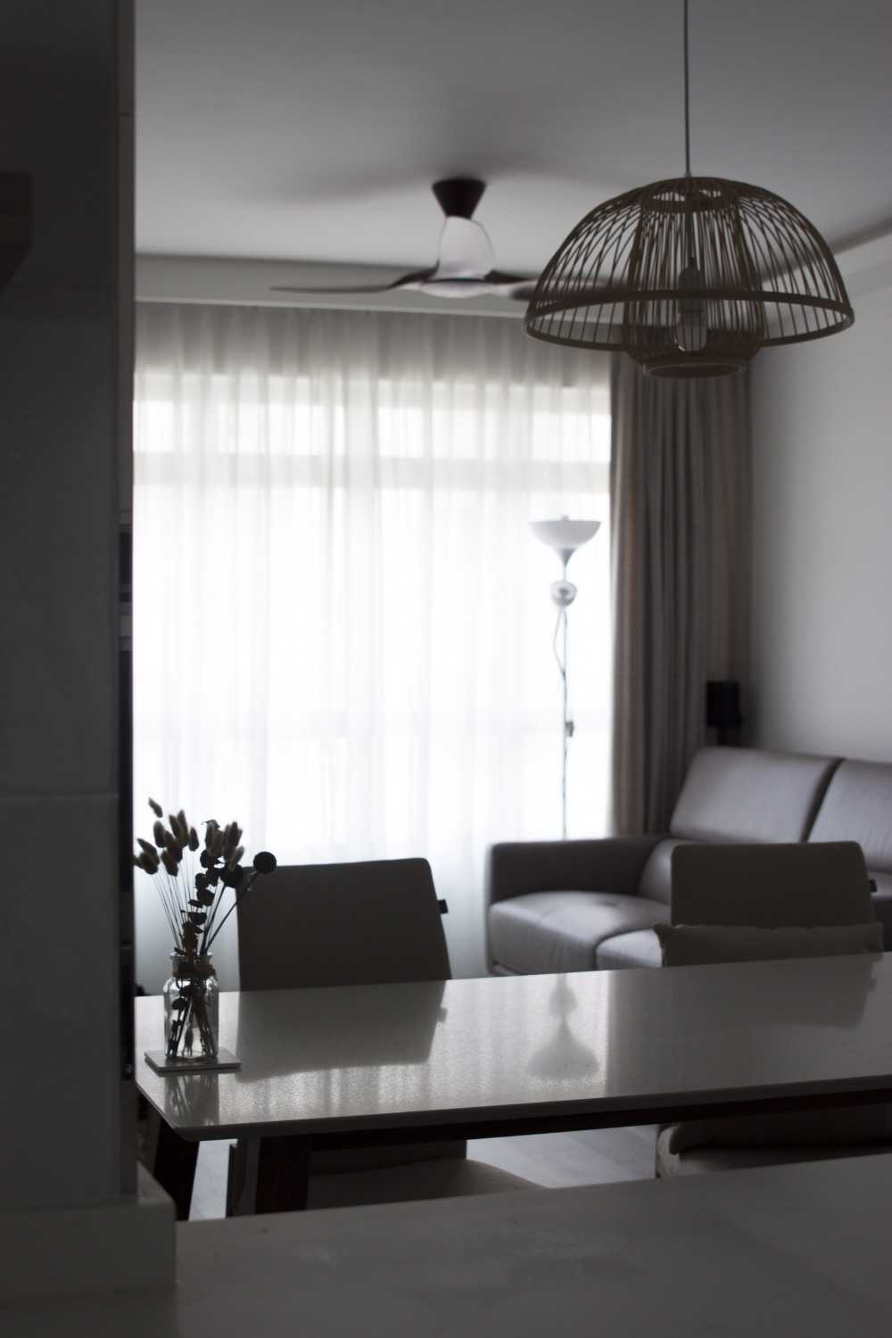 Scandinavian Dining Room with Curtain and Sofa