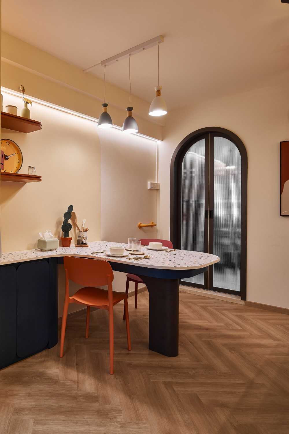 Eclectic Dining Room with Drop Light and Dining Table