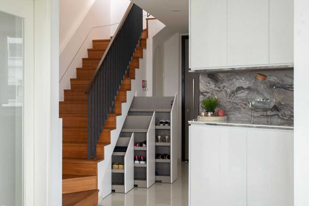 Modern Living Room with Staircase and Storage Cabinets