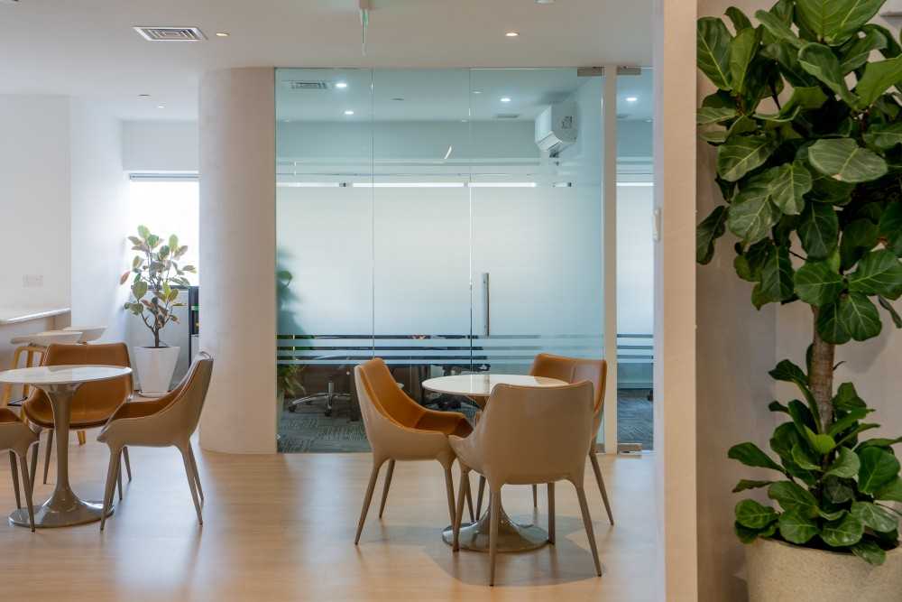 Contemporary Office with Coffee Table and Planters