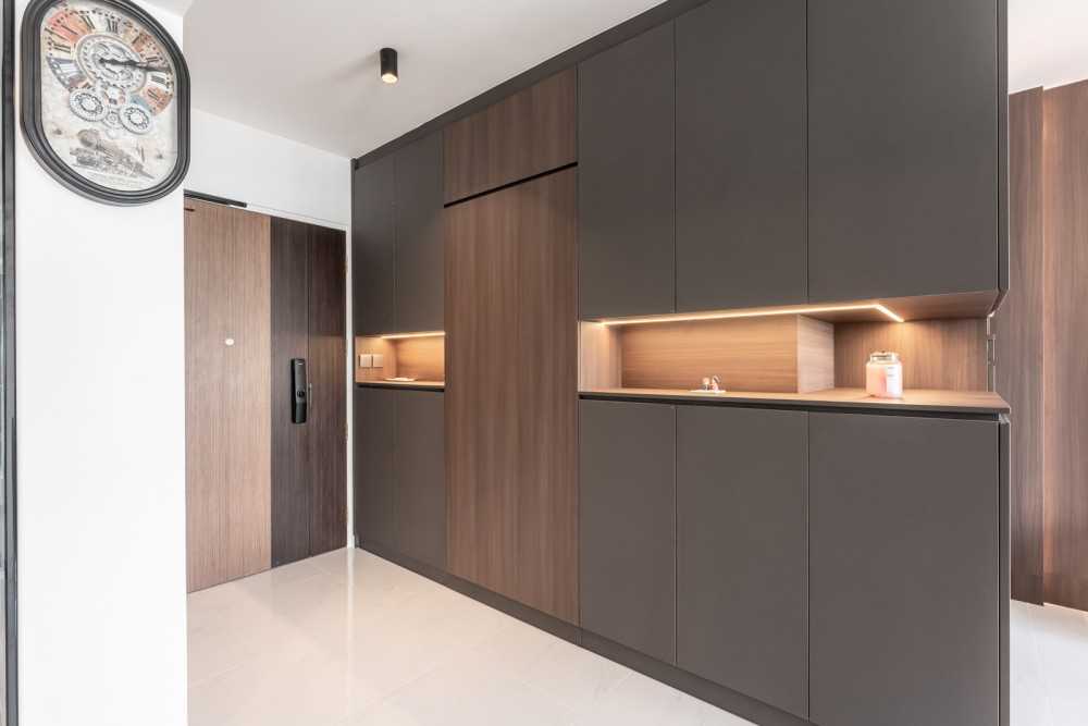 Modern Foyer with Feature Wall and Storage Cabinets