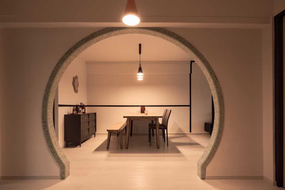 Asian Dining Room with Drop Light and Dining Table