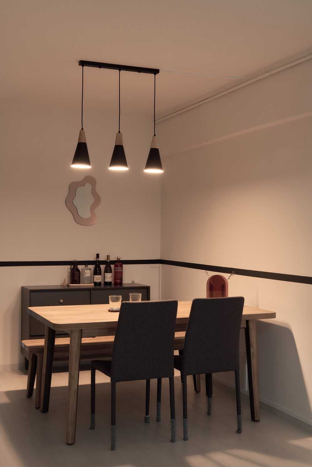 Asian Dining Room with Drop Light and Dining Table