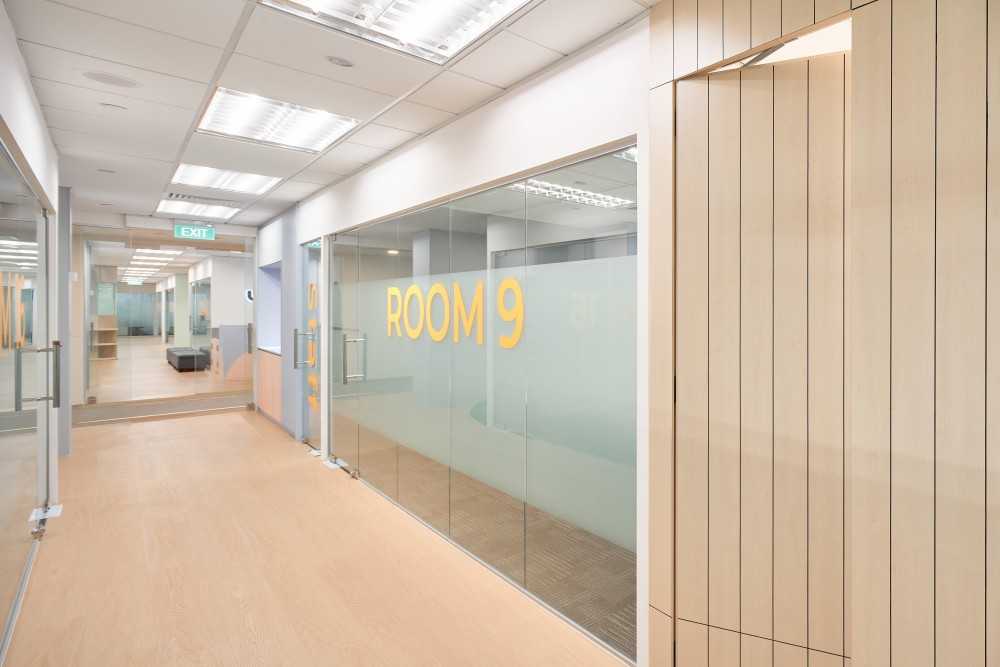 Scandinavian Office with Glass Door and Carpet