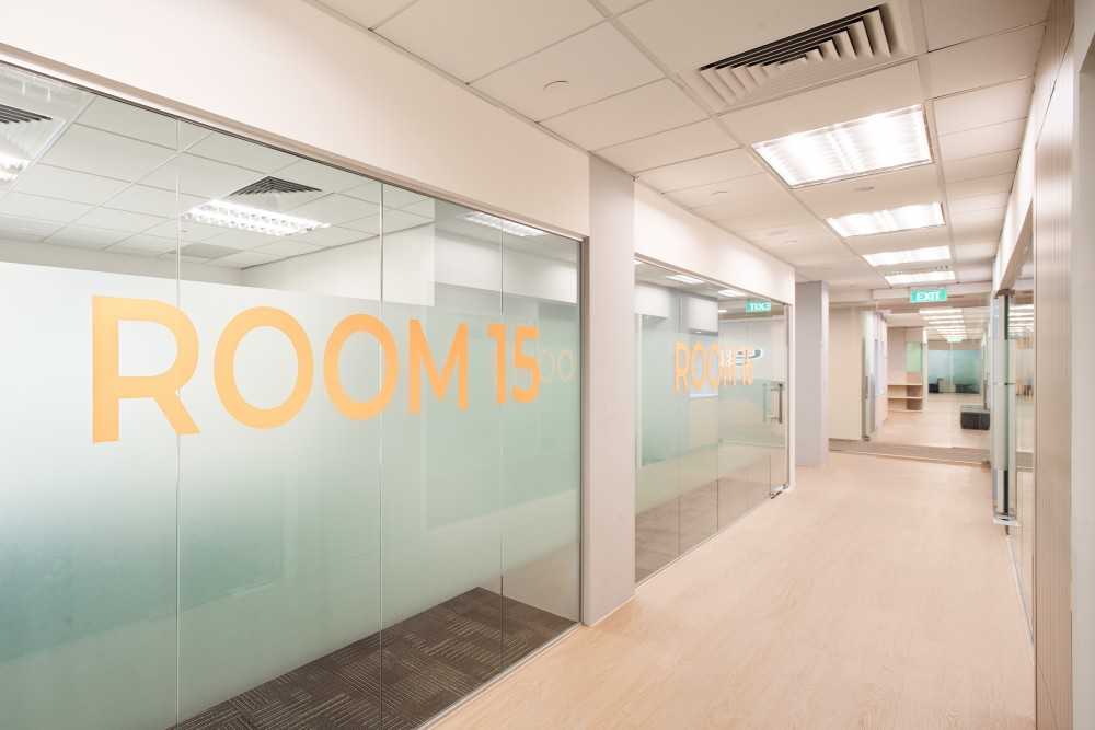 Scandinavian Office with Glass Door and Carpet