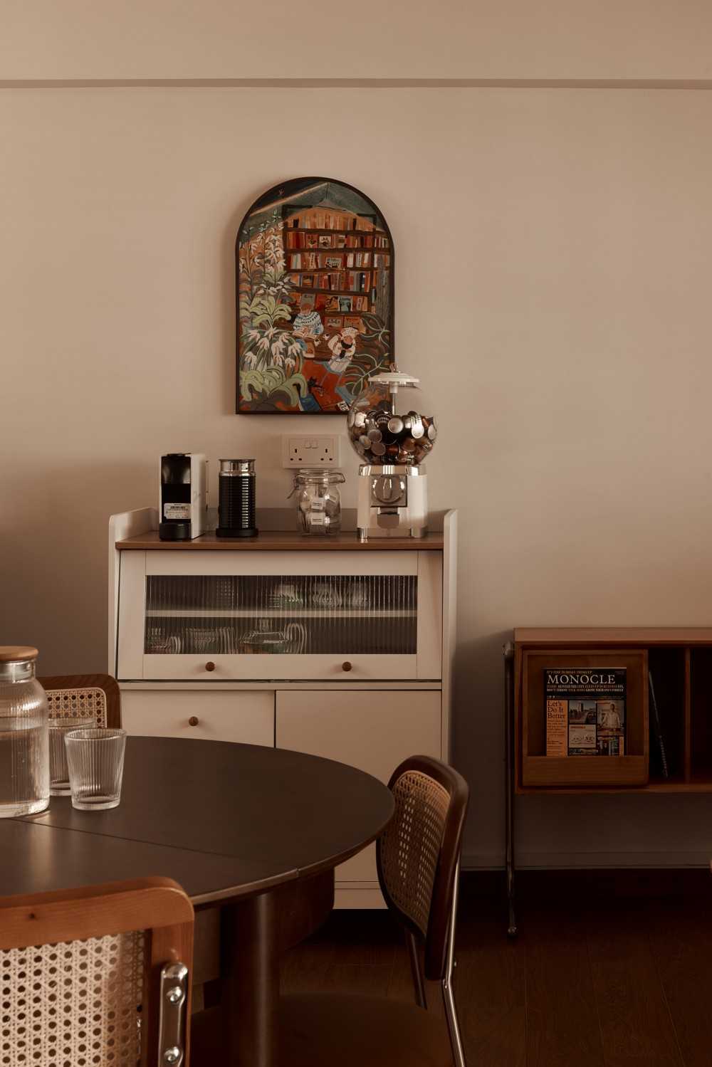 Scandinavian Living Room with Paintings and Storage Cabinets