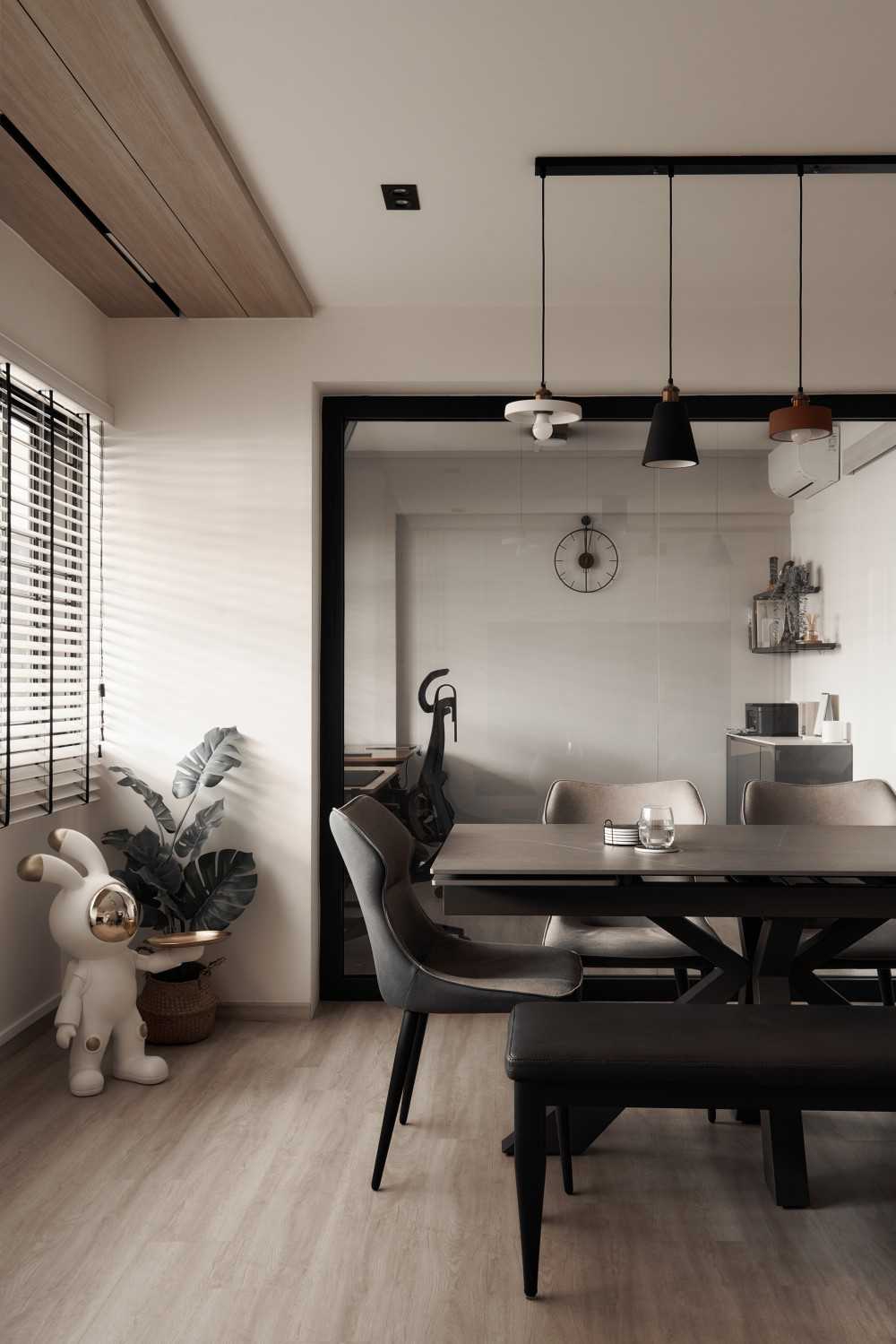 Scandinavian Dining Room with Drop Light and Glass Door