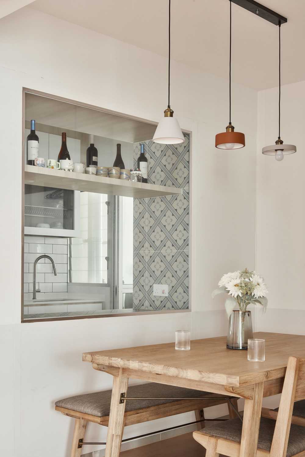 Scandinavian Dining Room with Drop Light and Dining Table