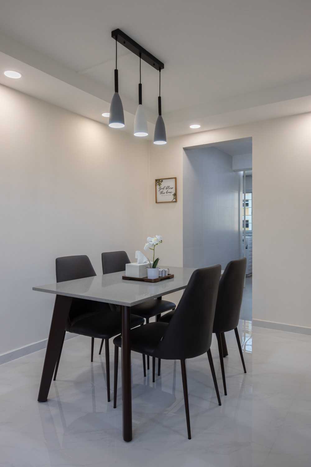 Contemporary Dining Room with Drop Light and Dining Table