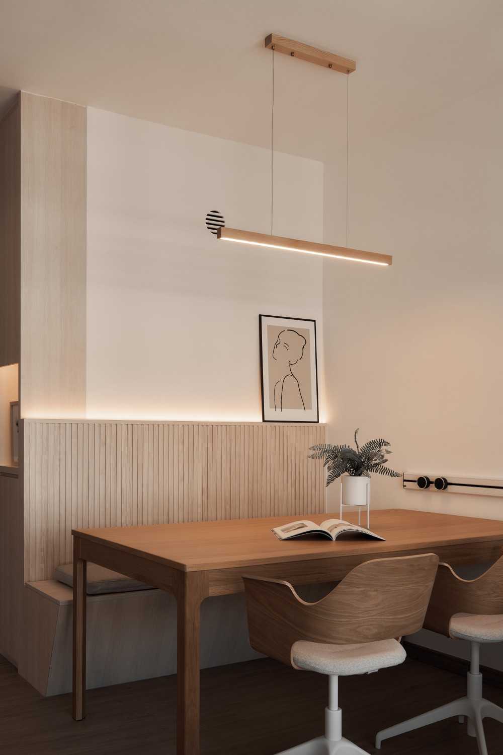 Minimalist Dining Room with Drop Light and Panelling