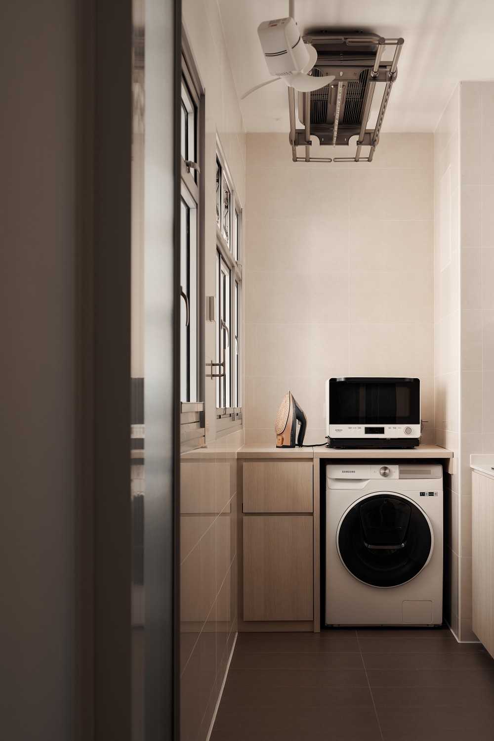Minimalist Service Yard with Laundry Area and Ironing Board