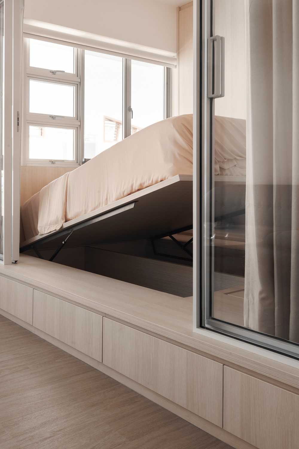Minimalist Bedroom with Platform Bed and Storage Cabinets