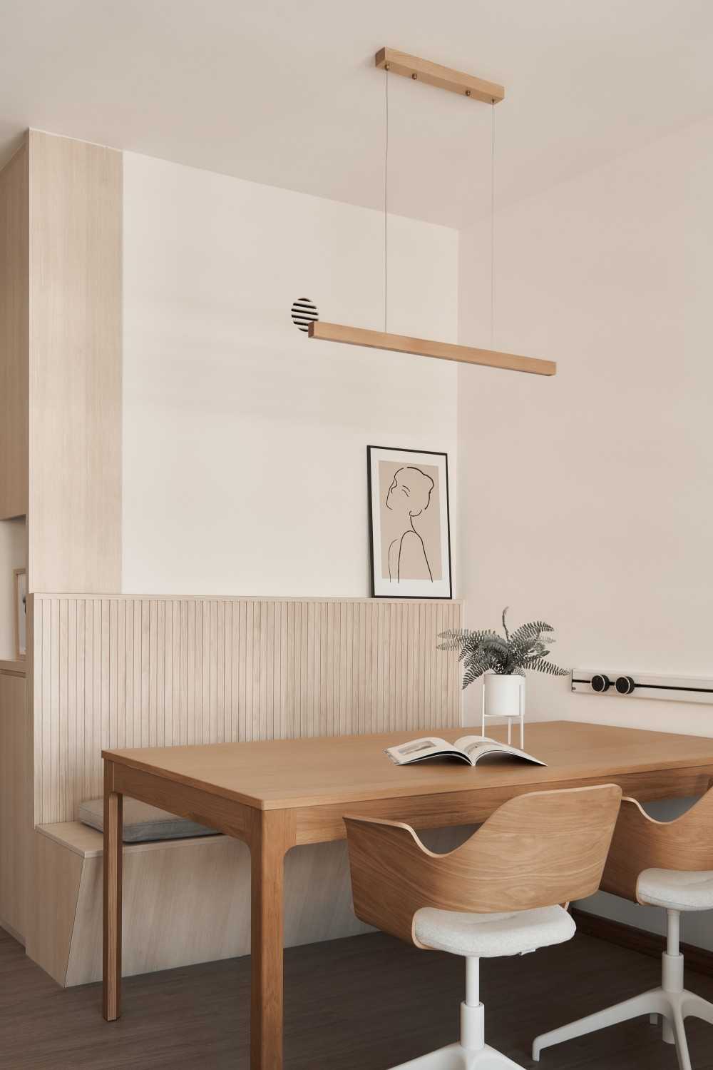 Minimalist Dining Room with Drop Light and Panelling