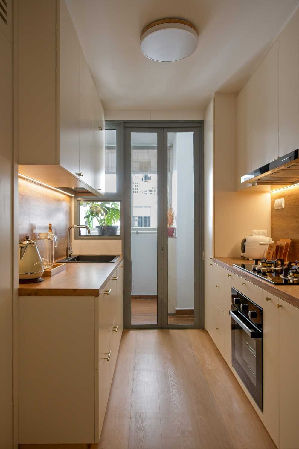 Minimalist Kitchen with Vinyl Flooring and Kitchen Tap