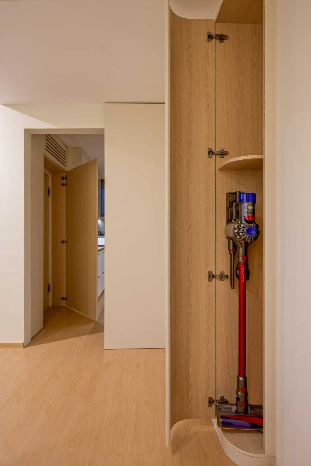 Minimalist Entryway with Storage Cabinets and Doors
