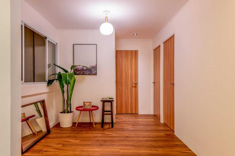 Contemporary Hallway with Mirror and Window Seat