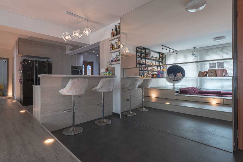 Scandinavian Dining Room with Drop Light and Mirror