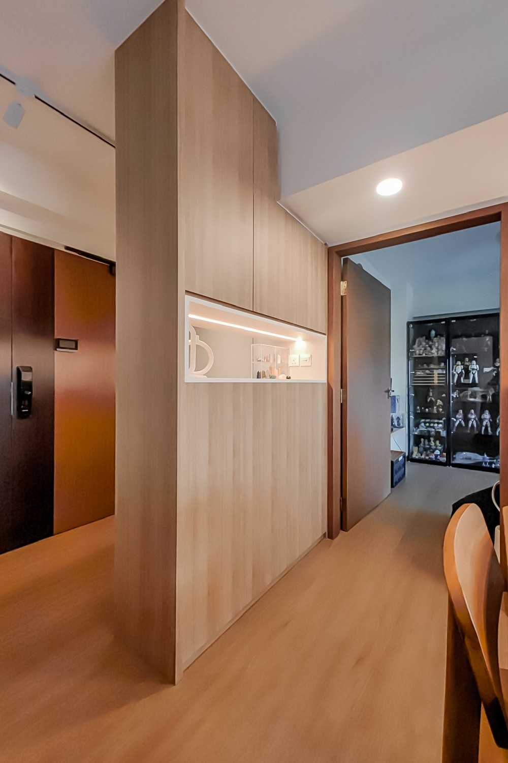 Scandinavian Hallway with Wood Flooring and Feature Wall