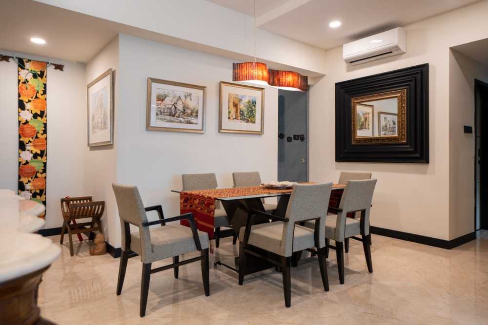 Modern Dining Room with Drop Light and Cove Lighting