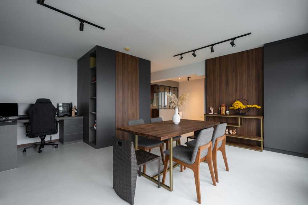 Minimalist Dining Room with Drop Light and Dining Table