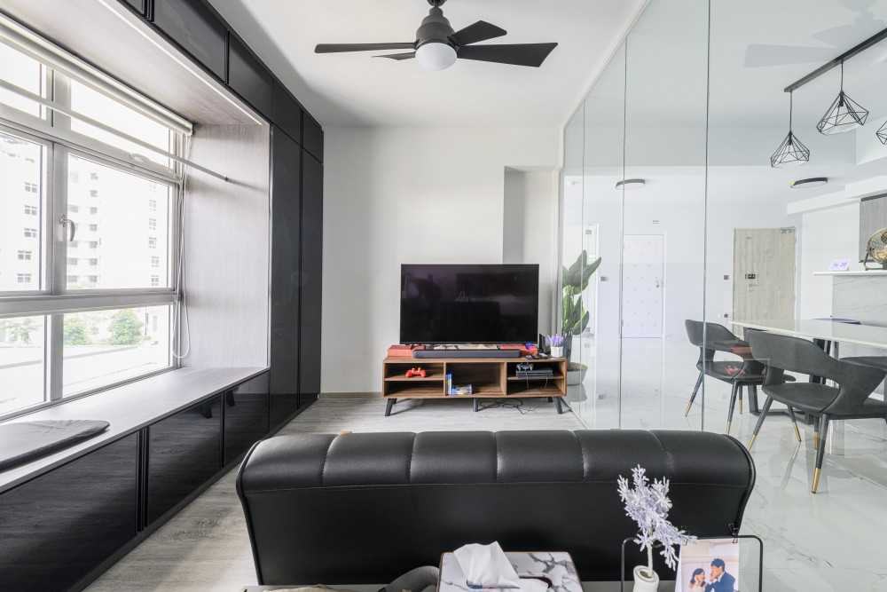Minimalist Living Room with TV Console and Glass Door