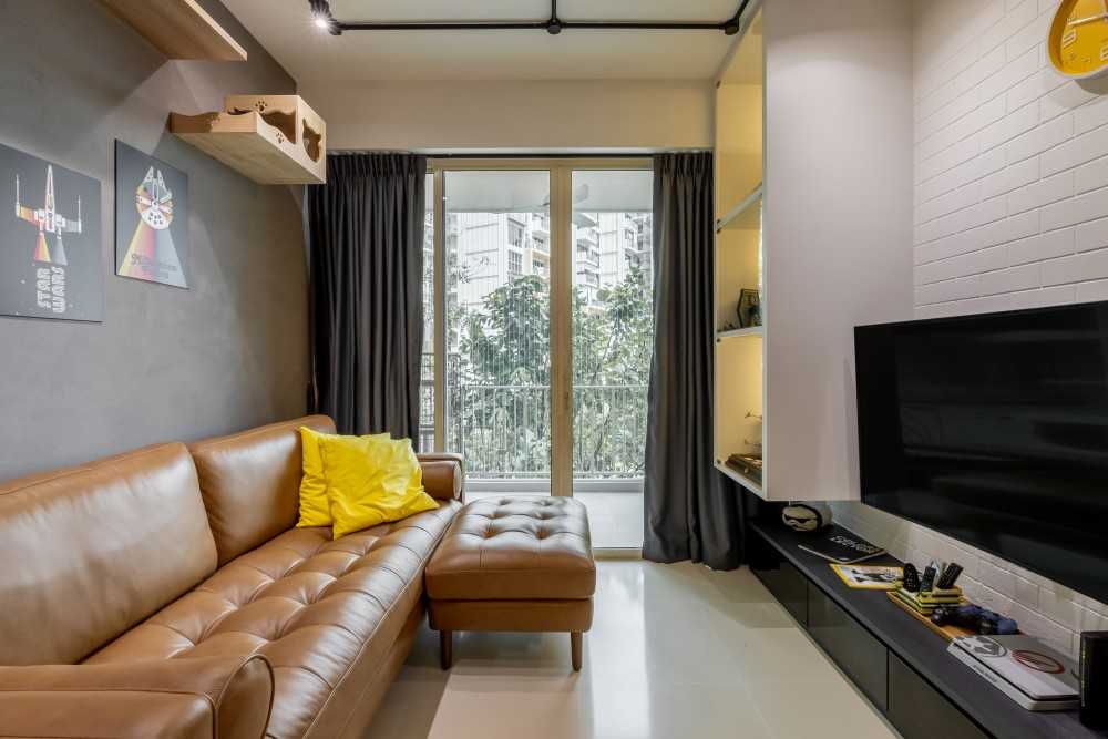 Industrial Living Room with Bookshelf and Feature Wall