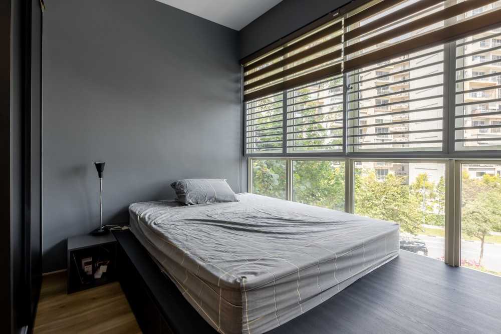 Industrial Bedroom with Platform Bed and Bay Window